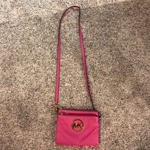 Bright pink Michael Kors crossbody/wallet